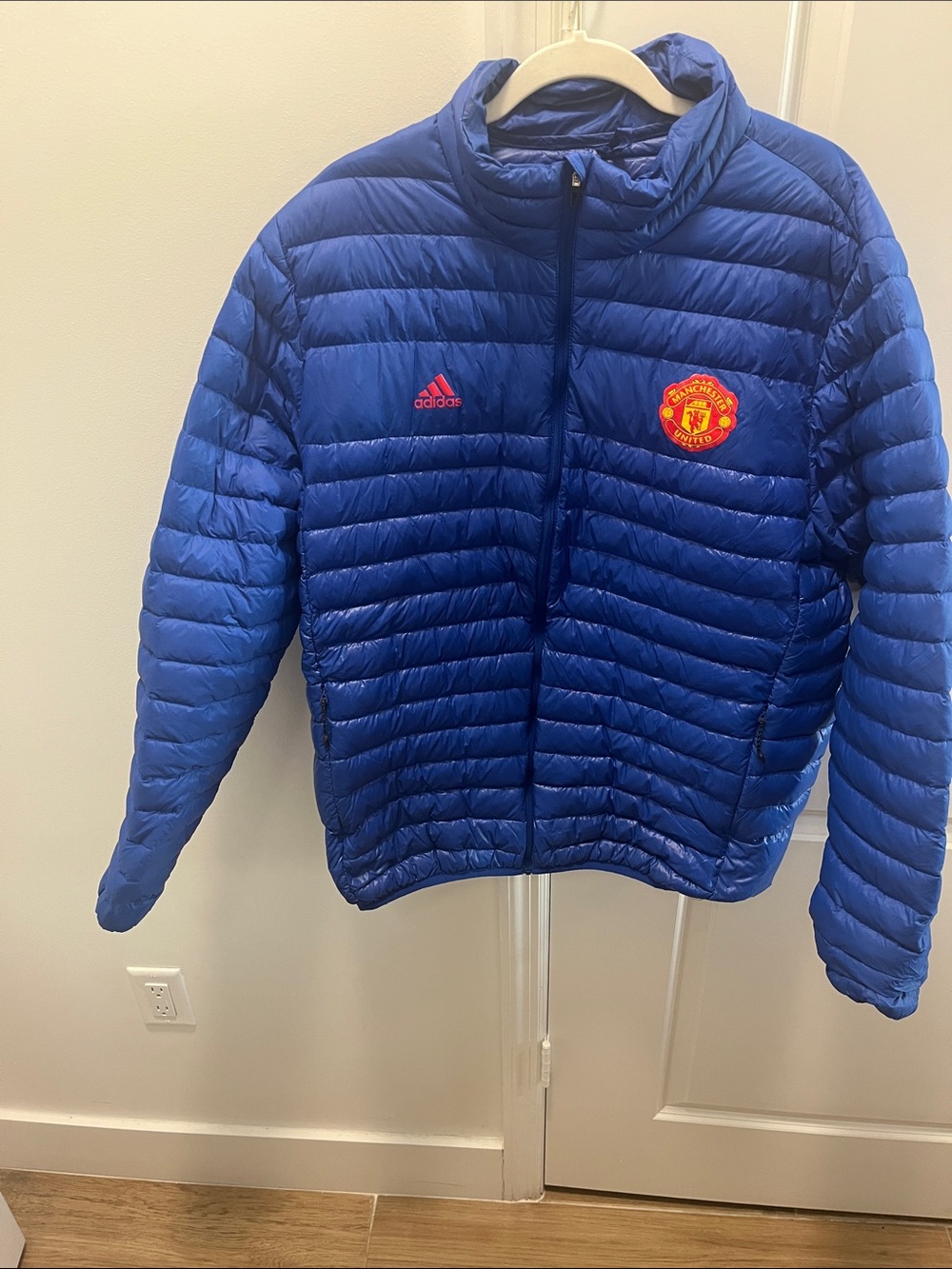 adidas Kids Blue Puffer Jacket with Red Manchester United Crest
